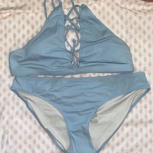 High neck, low waisted baby blue bikini.